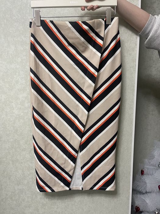 Платья юбки комбинезоны