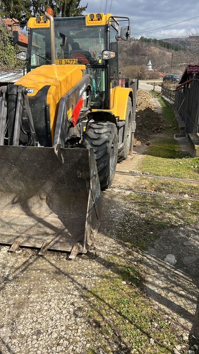Buldoexcavator Terex TLB 890 SM