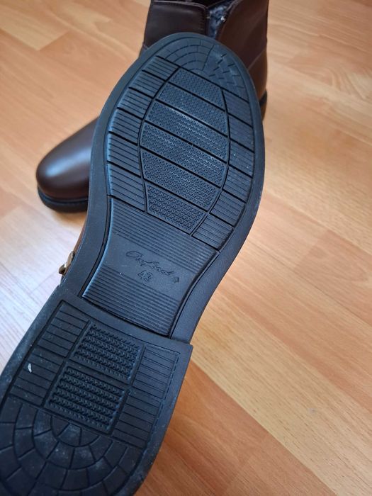 Продам новые сапоги мужские