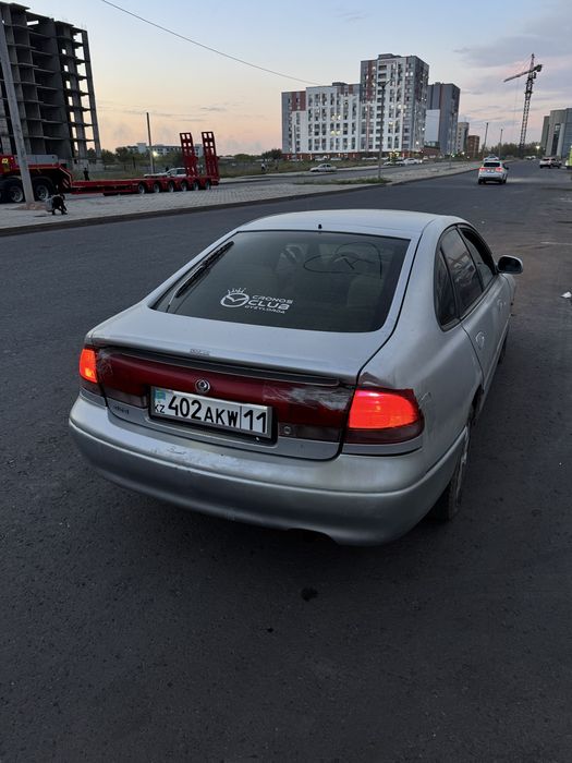 Мазда кронос 1996 обем 2