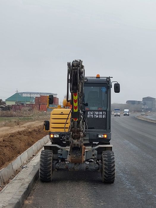 Услуги экскаватор Малютка