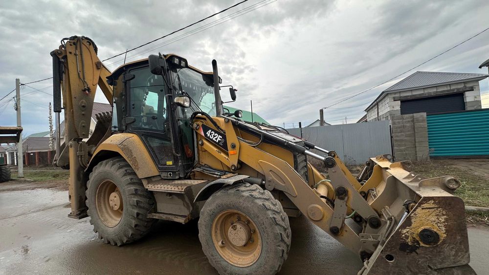 Услуги экскаватоа-погрузчика