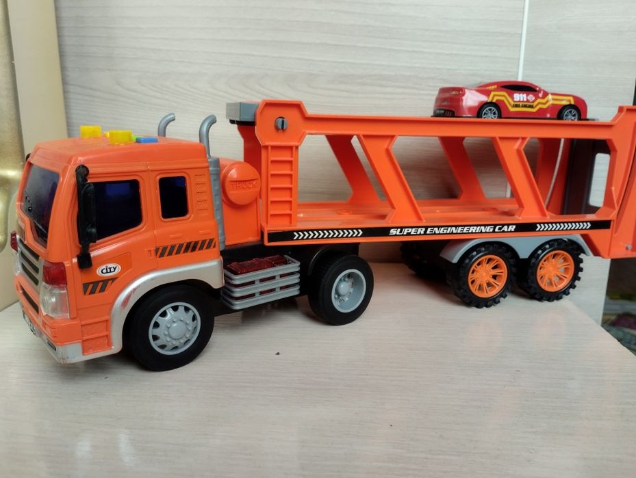 Игрушки Автовоз музыкальный