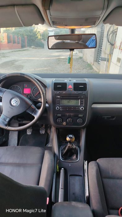 Volkswagen Golf 2005 benzină, 1.401 € — imagine 4