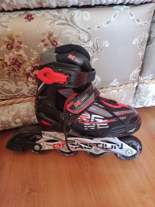 Роликовые коньки