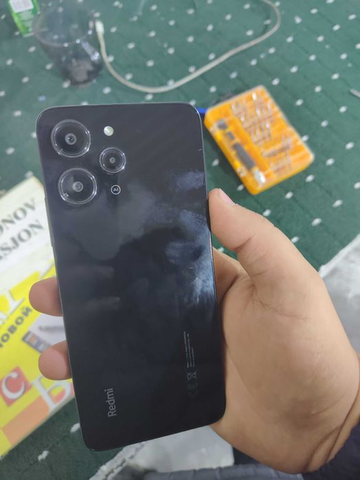 Redmi 12 holati idial yangidek 2 oy ishlagan