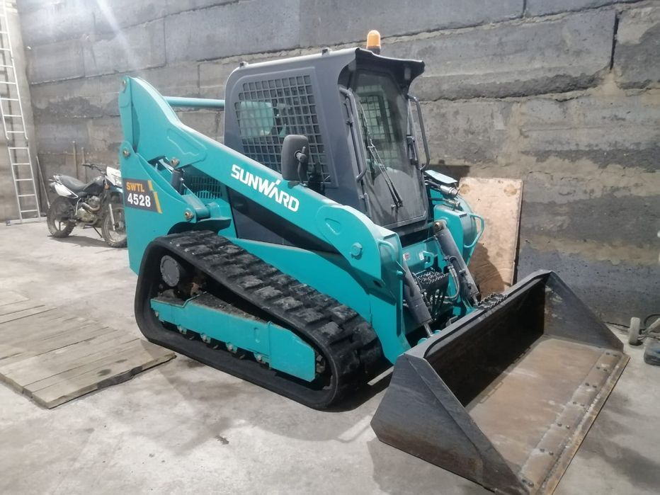 Гусеничный минипогрузчик