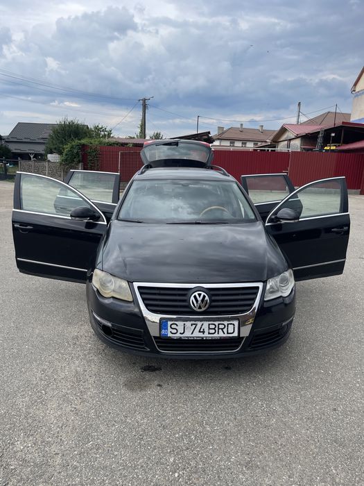 VW Passat B6 + două seturi de anvelope de iarnă (8 bucăți)