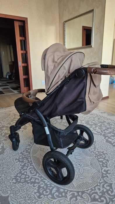 Продам  Б/У коляску TOMIX (всесезонная). Астана