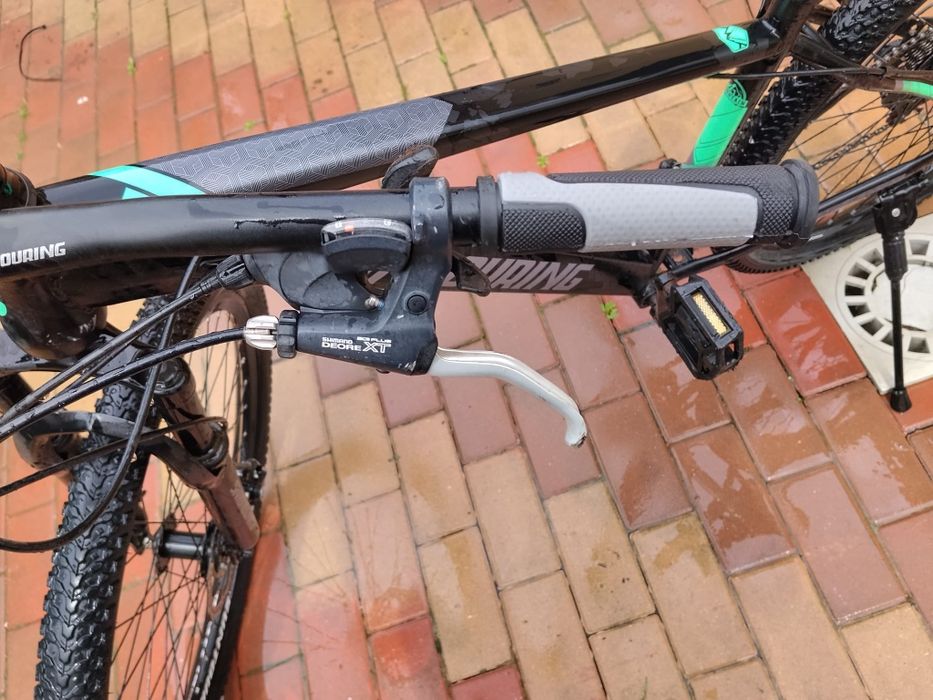 Vând bicicleta Suntouring de 27 inci.