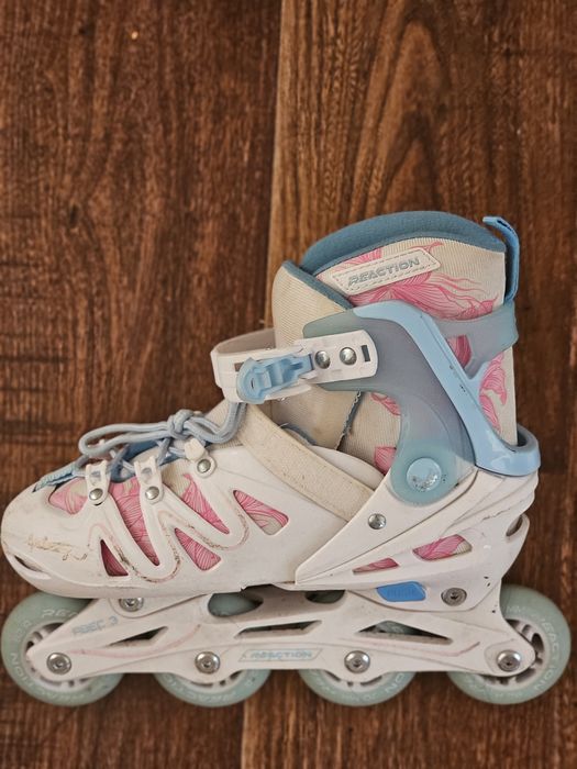 Коньки роликовые