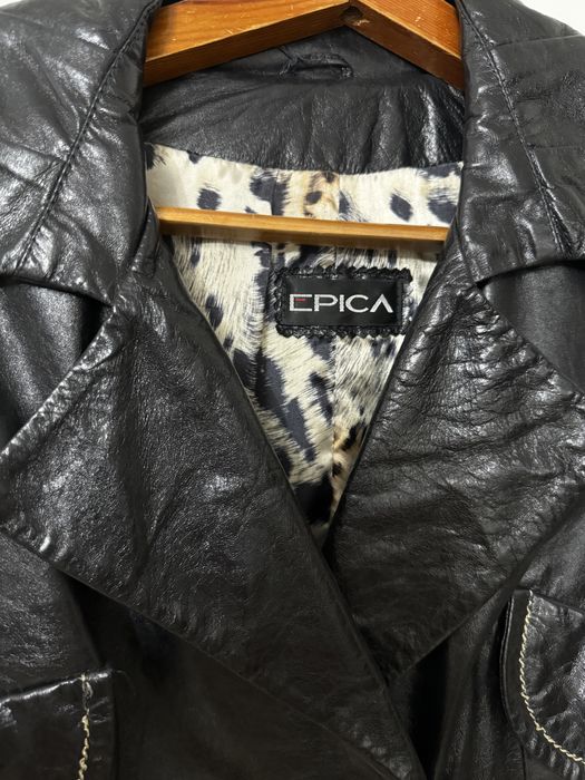 Кожаный плащ женский