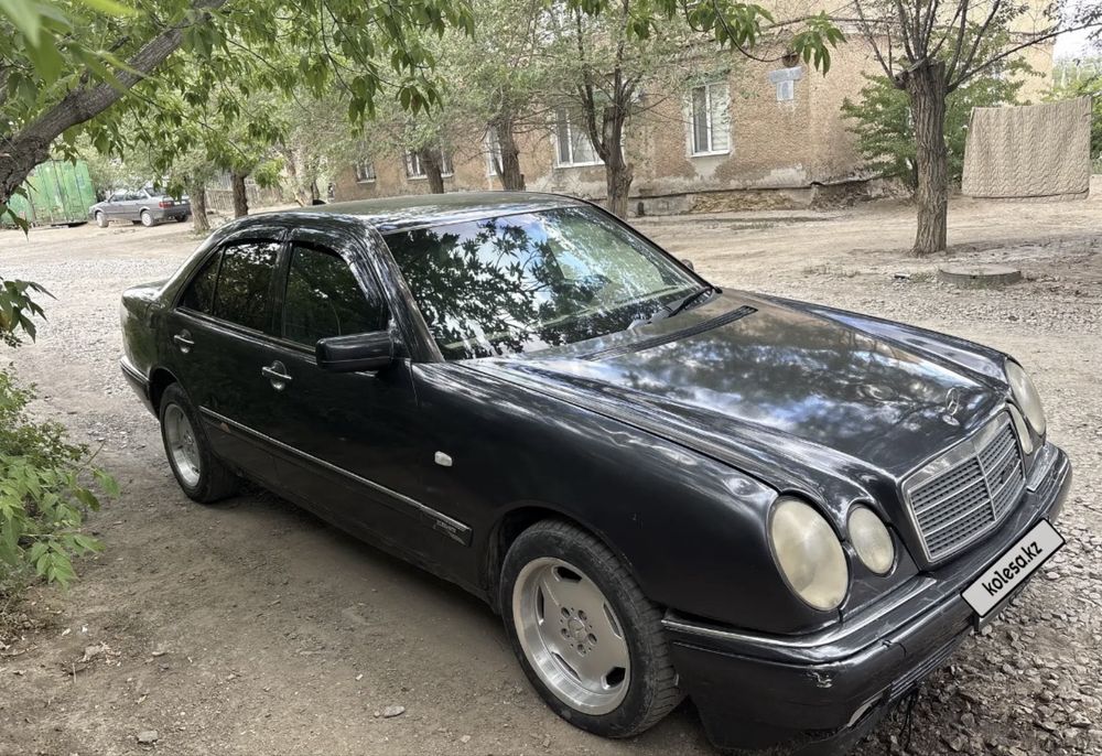 Мерседес Бенз 210