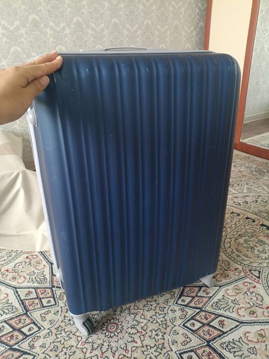 Чемодан в колесах