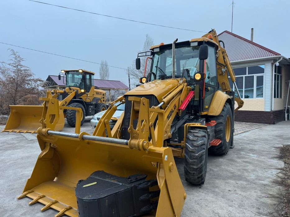 Эксковатор погрузчик 3в1