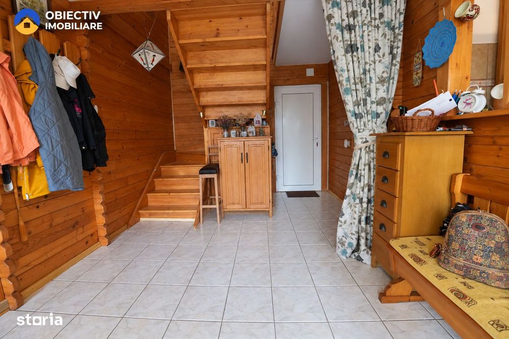 Casa din lemn P+M 191 mp, teren 2.199 mp, Almas - Garcina, zona retras