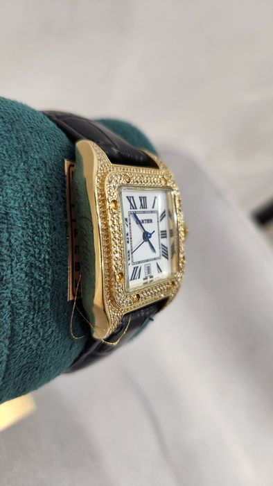 Золотые женские часы Cartier