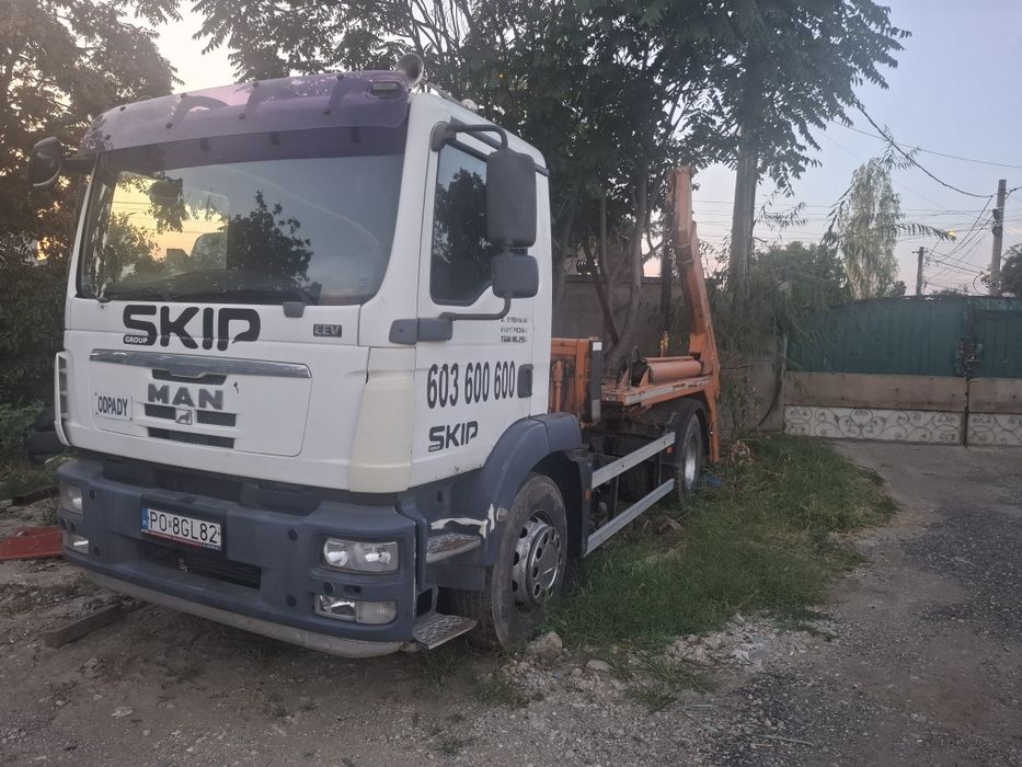 Man 18,250 abrollkipper cu lanțuri pentru containiera container moluz moloz skip  18 tone recent adus