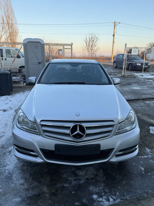 Dezmembrez  c class w204 2.2 cdi punte stop far capota bara aripa