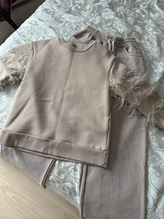 Одежда по 5 000 тенге