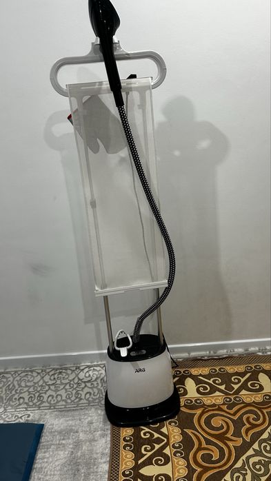 Паровой утюг (Отпариватель)