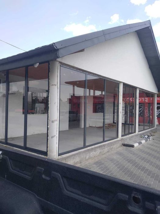 Închideri terase cu sisteme glisante din aluminiu