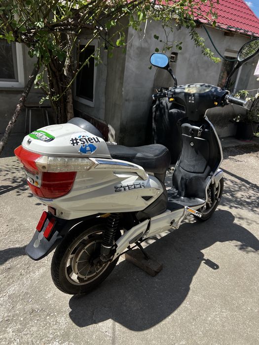 Bicicletă electrică cu pedale