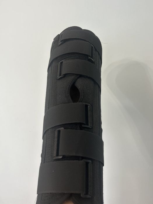 Коленный тутор (бандаж)