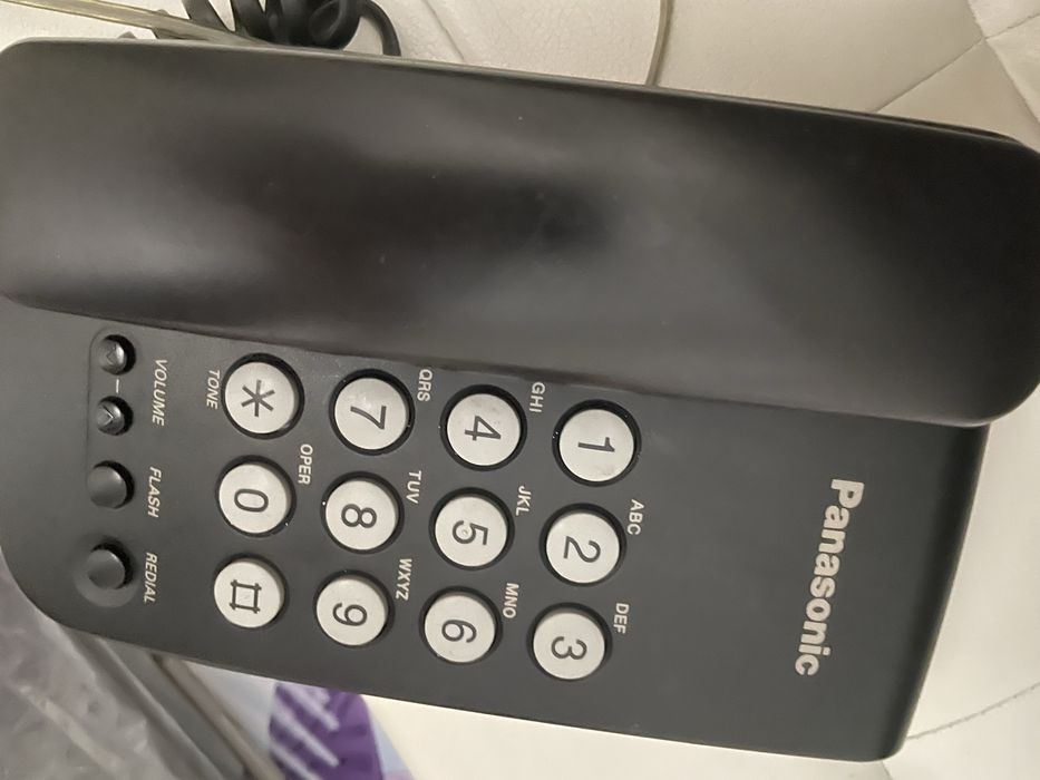 Продам проводной телефон