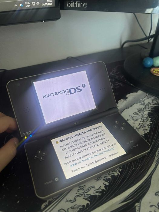 Nintendo DSi XL Bronz with charger and pen