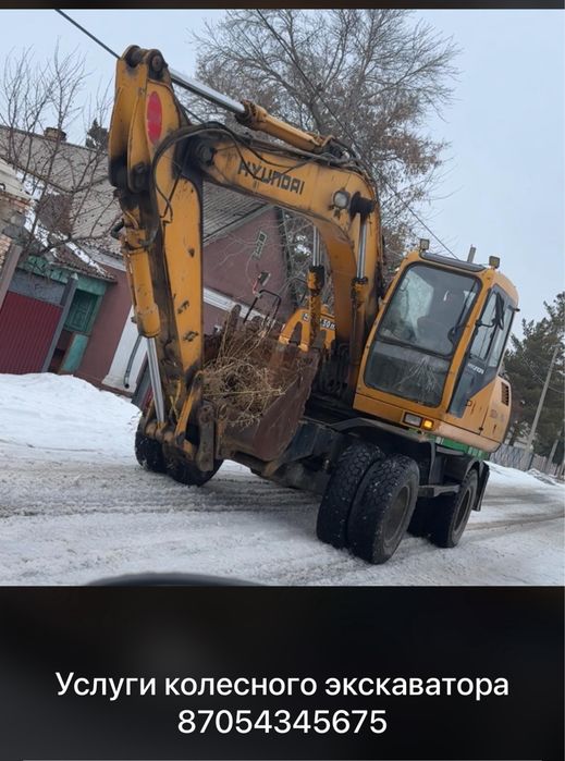 Услуги колесного Экскаватора хюндай ковш .09 куб