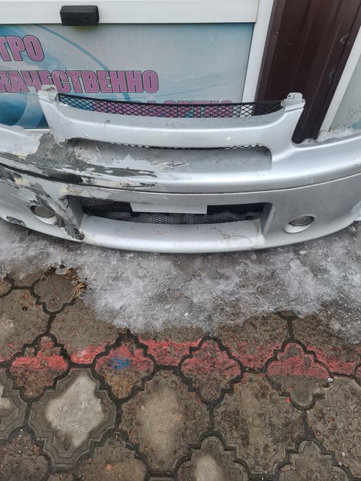 Бампер передний ниссан
