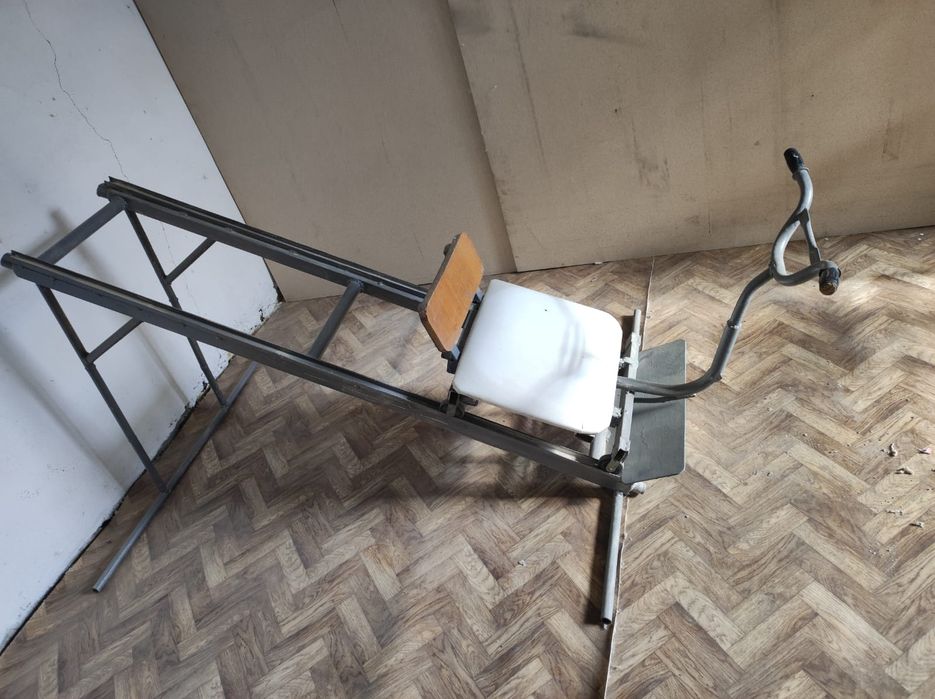 Тренажер для разработки ног.