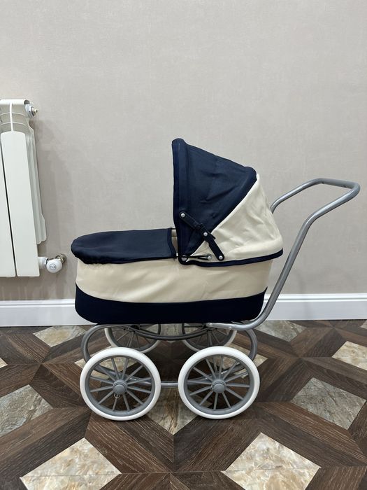 Игрушечная коляска