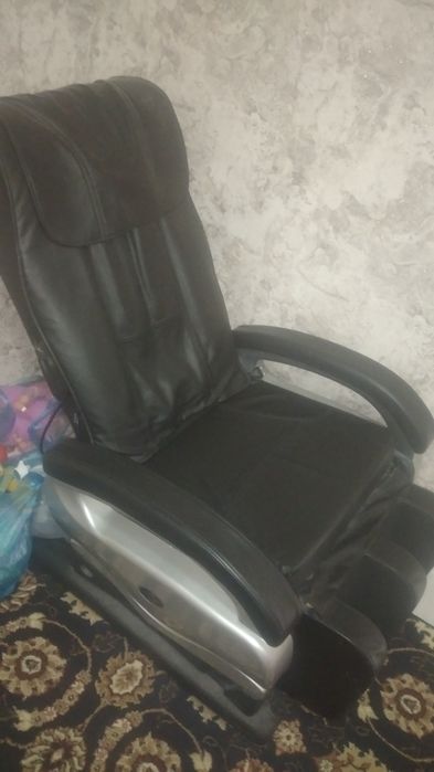 Массажный кресло