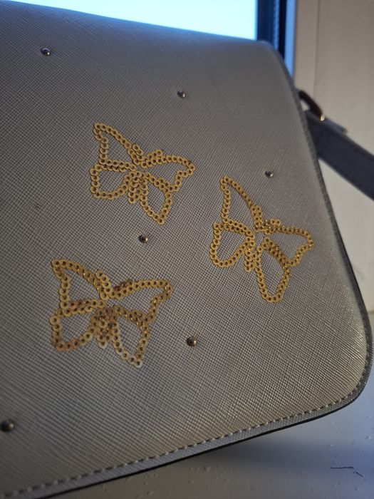 Белая женская сумка