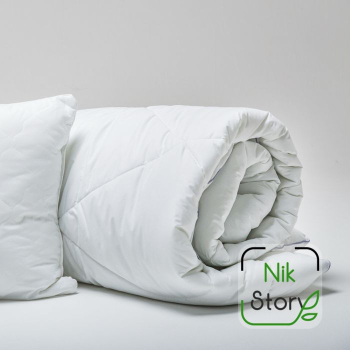 Продам два одеяла 140х205