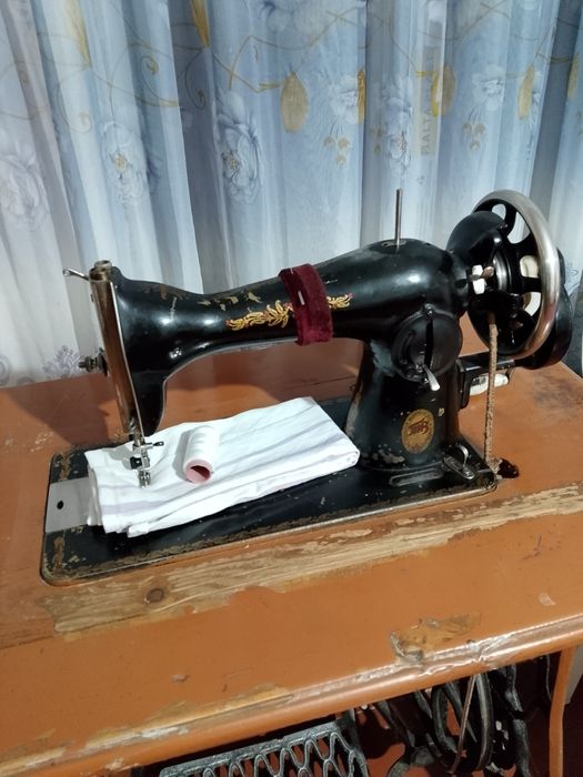 Швейная машина зингер