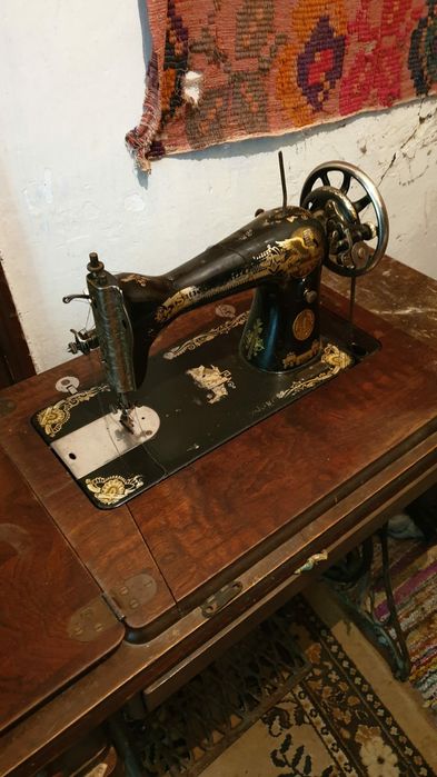 Masina de cusut Singer