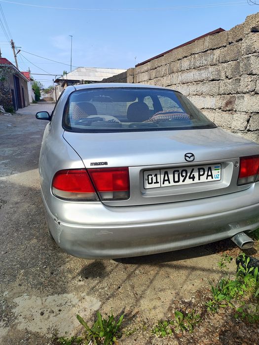 Мазда Кронос хххххх