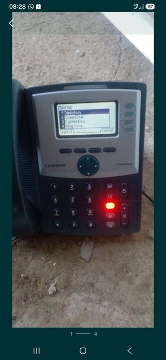 Телефон Linksys.