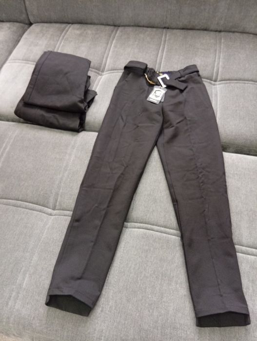 Женские брюки хорошого качества с итекеткой новая