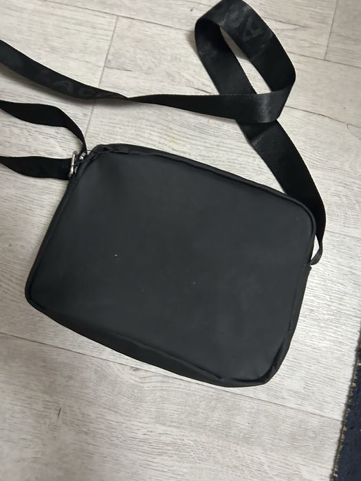 Барсетка Lacoste обсолютно новая