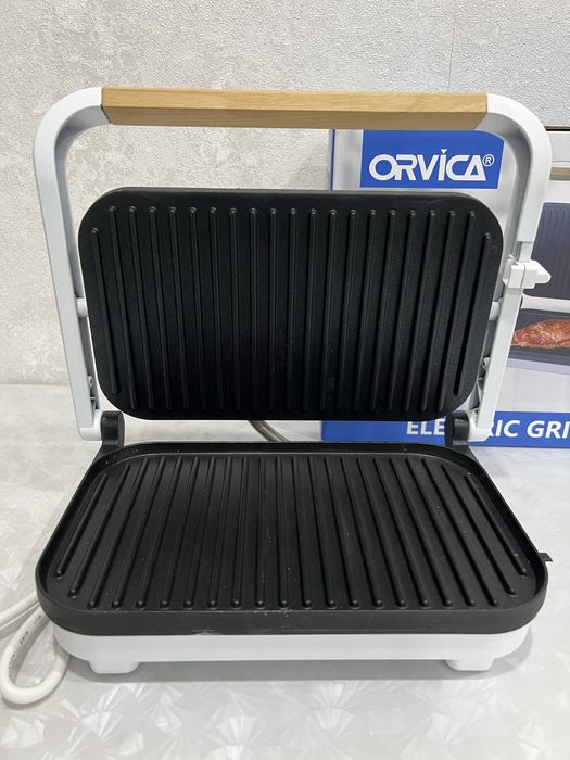 Продам новый электрогриль ORVICA