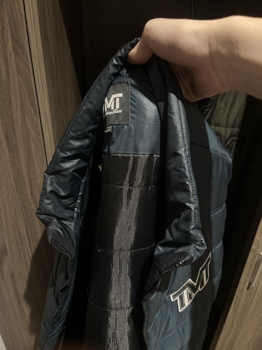 Безрукавка TMT.