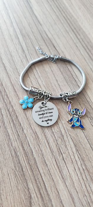 Гривна с талисмани  Stitch