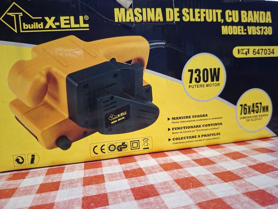 Masina  de  slefuit  cu  banda  .