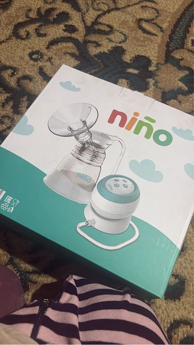 Электрический молокоотсос