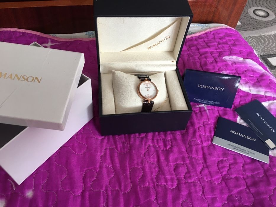 Продам женские часы Romanson