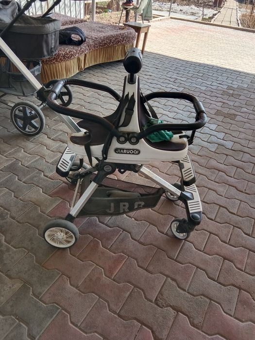 Коляски велосипеды